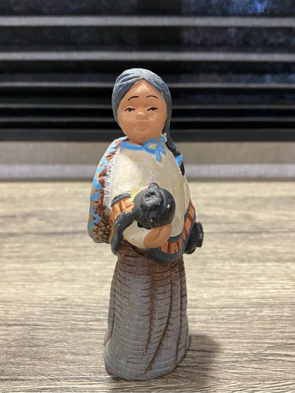 Hand-Painted Native Woman Figurine in Earth Tones